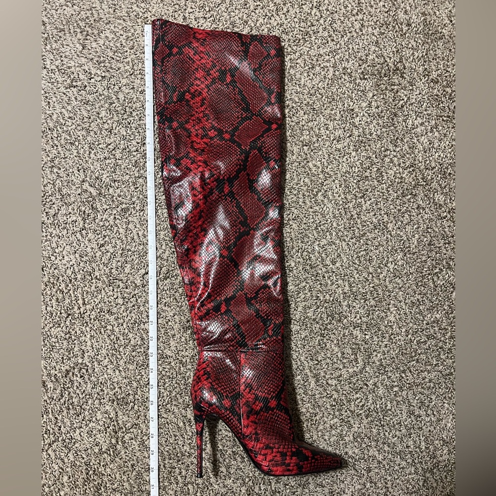 Winnie Harlow - Thigh high red snake boots